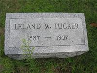 Tucker, Leland W